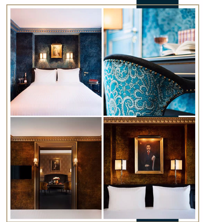 Luxury hotel room with deep blue walls, gold accents, and elegant furnishings